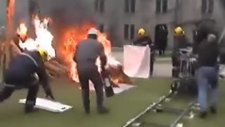 Filming someone burned at the stake