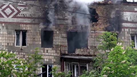 Falling drone debris spark fires in buildings across Kyiv