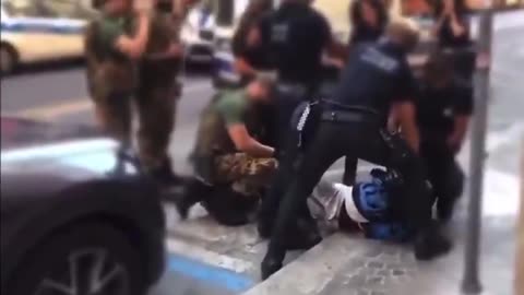 BOLOGNA ITALY A 30-year-old Malian migrant was arrested after assaulting a pedestrian with knives