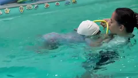 The child swims
