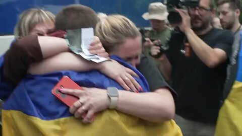 Tears of joy as families reunite with Ukrainian POWs released as part of swap deal with Russia