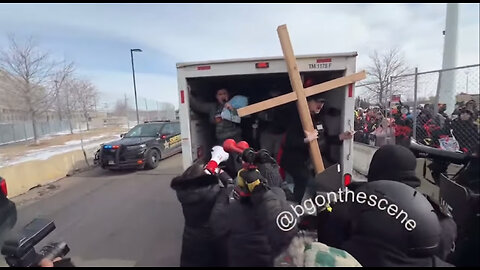 Jake Lang Rides in U-Haul Outside Federal Building in Minnesota