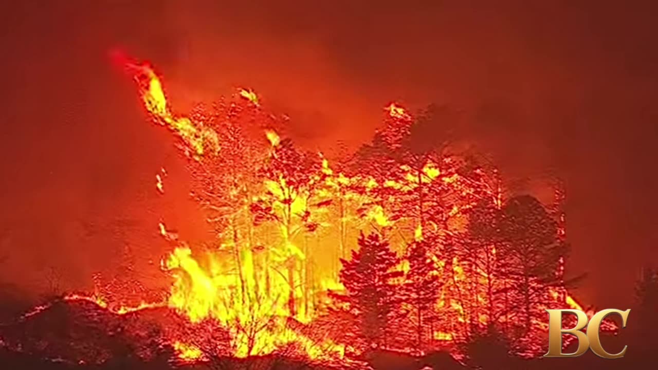 N.J. wildfire shuts major highway and forces thousands to evacuate