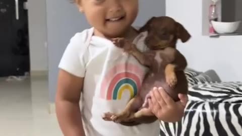 Baby Holding a Baby