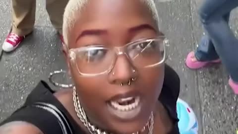 A Black woman demands reparations from anyone who isn't Black