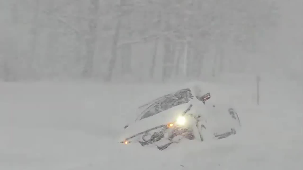 SNOW BURIES city of Oswego, New York