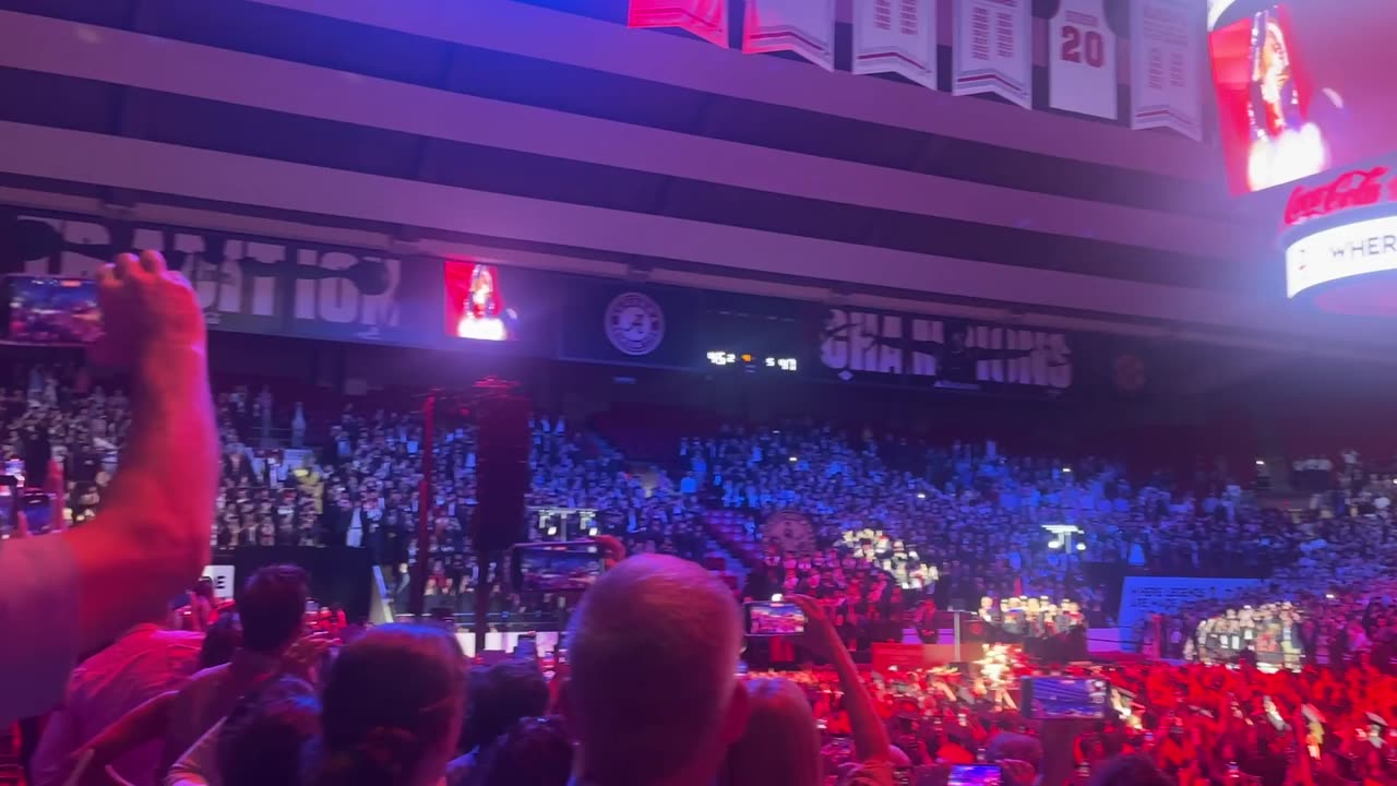 The University of Alabama crowd rises to cheer for POTUS, erupting in chants