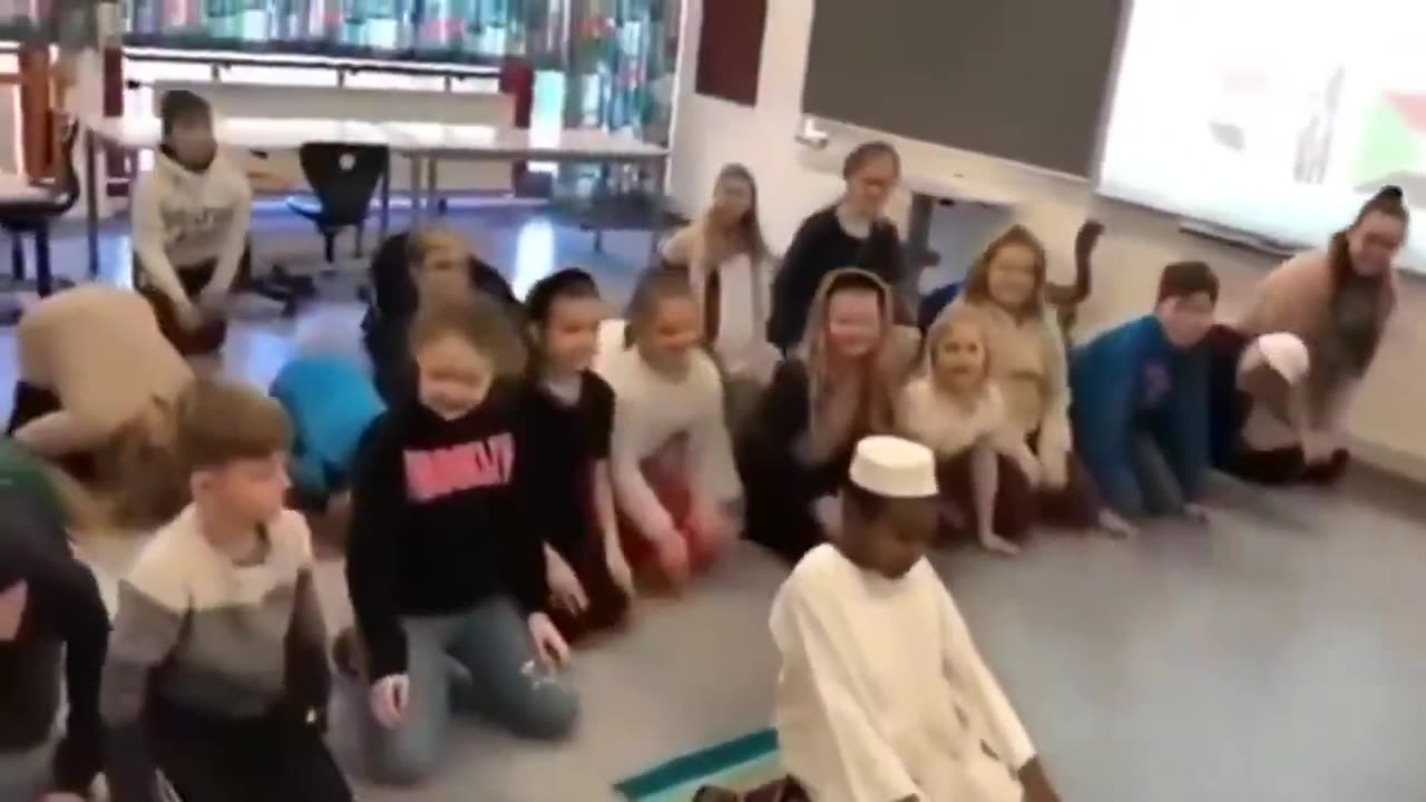 Children being forced to learn and perform Islamic prayers in Denmark, this is outrageous.