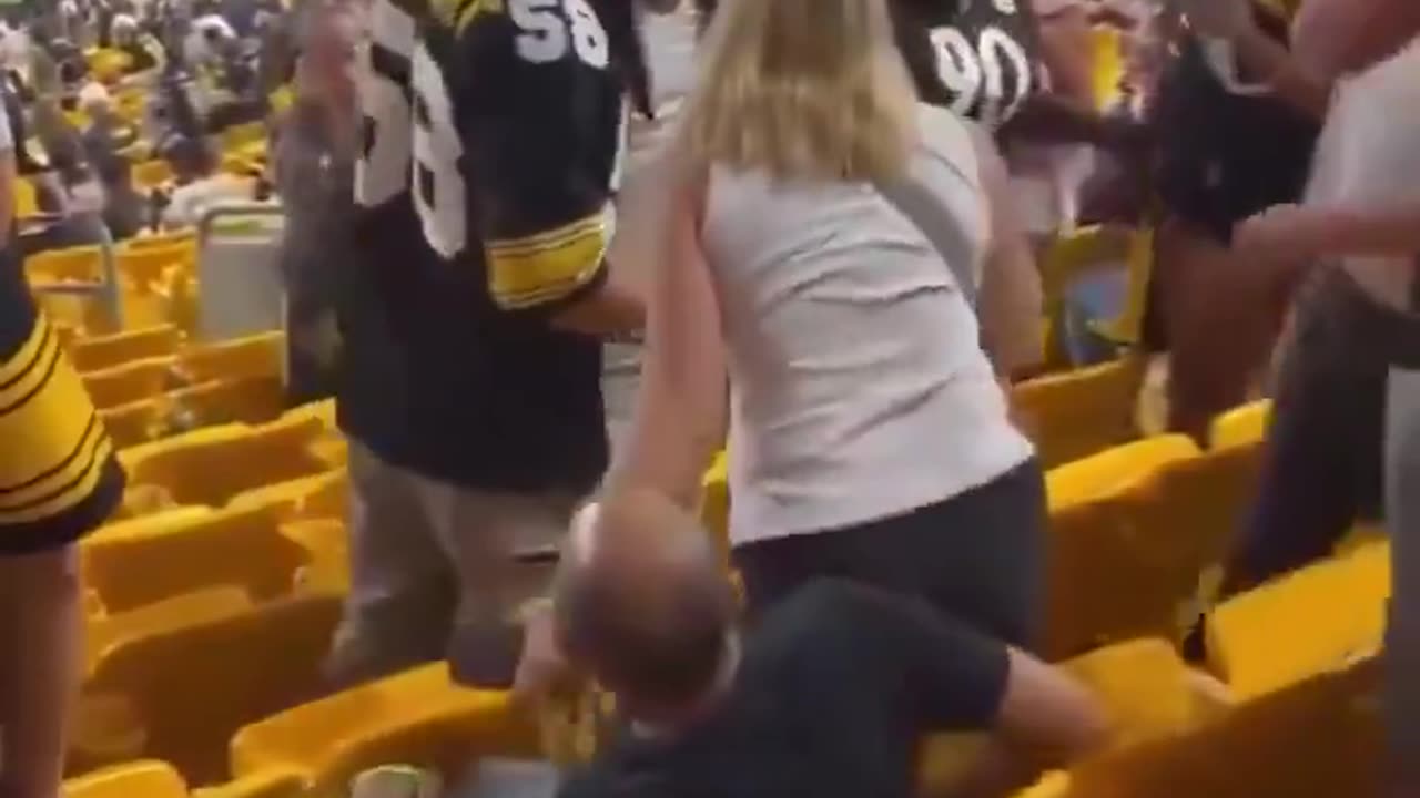 Man beats couple at football game