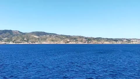 Epic Views: Mountains and Sea Collide on Sicily’s Strait Ferry Ride!
