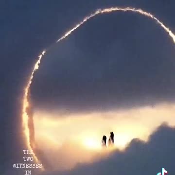 RING OF FIRE IN THE SKY WITH 2 FIGURES 4 -19-2025 DAY BEFORE EASTER SUNDAY