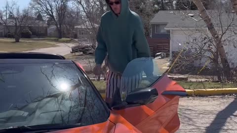Man Is Definitely Not Too Tall for His Corvette