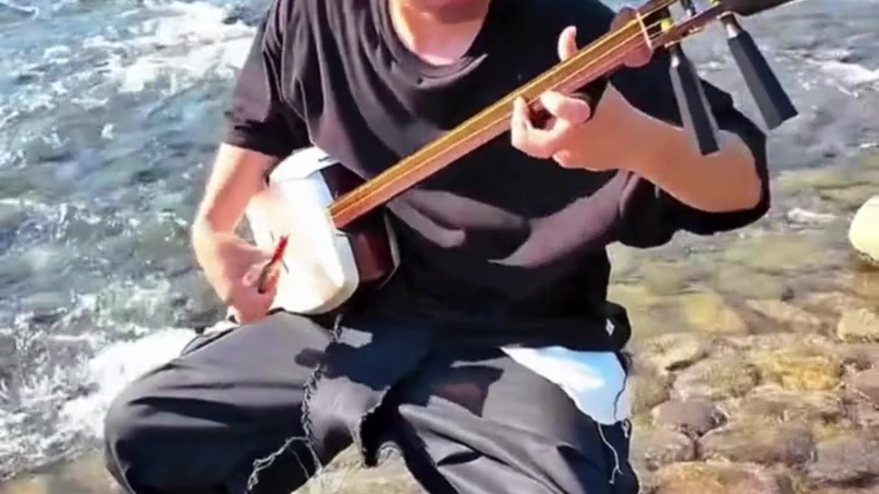 The Soulful Sound of Shamisen by the River 🎶🌊