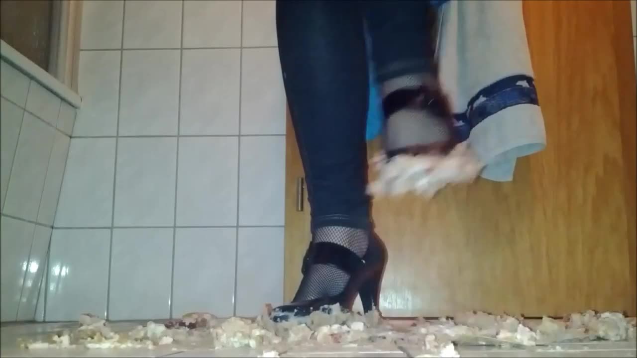 Adri Crushes a Cake