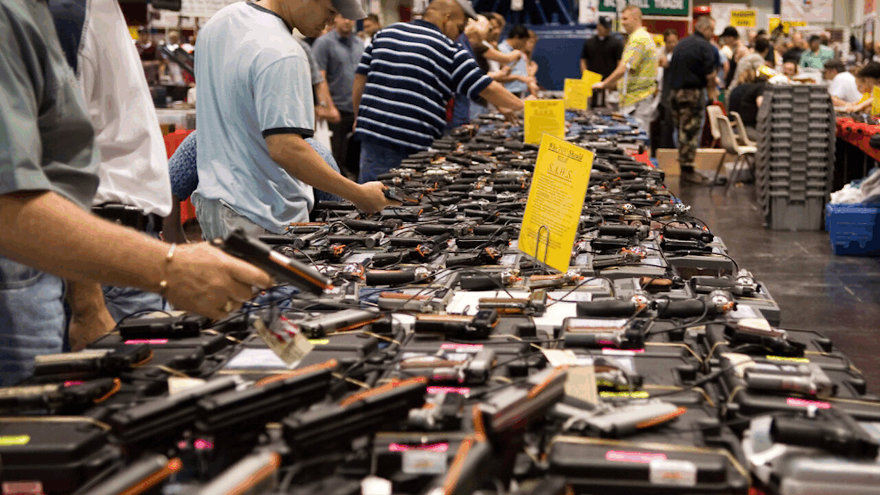 WATCH WHAT HAPPENS WHEN ANTI-GUN LIBERALS try to buy a gun at a gun show