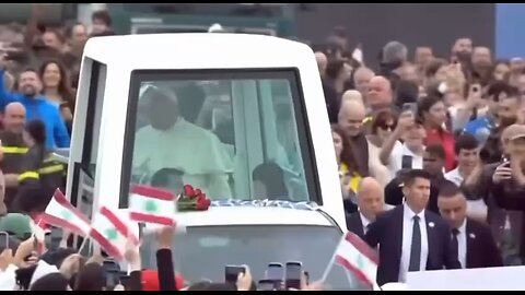 The video shows numerous people in Lebanon watching Pope