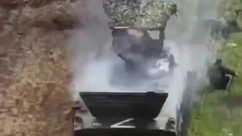 Quadcopter hits a BMP-2 personnel carrier