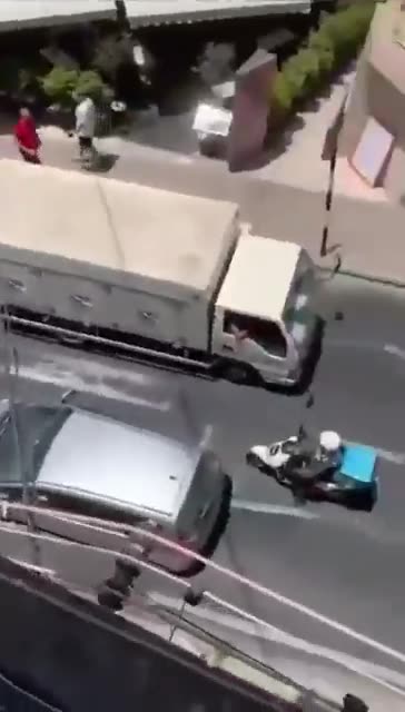 A fake asylum seeker in Malta punches a random car