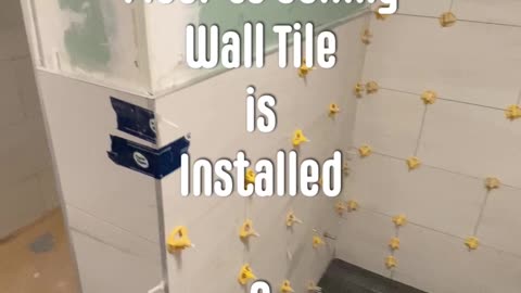 Reel #250 Floor to Ceiling Wall Tile is Installed - A Modern Bathroom Design