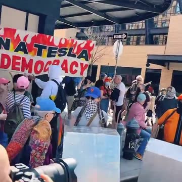 Leftists in NYC call for violence: "Burn a Tesla Save Democracy"