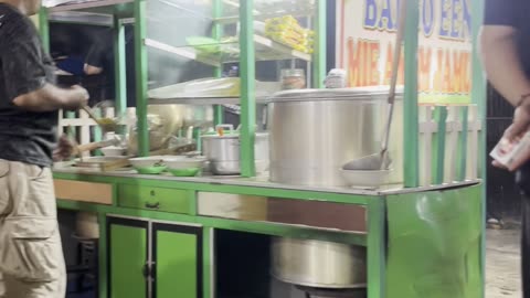 "The Bakso Man: A Street Vendor's Daily Journey"
