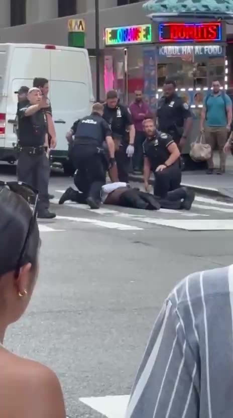 Manhattan: Initial report that the suspect was arrested on the 33rd floor where the shooting took place