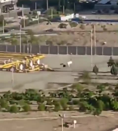 Footage shows long queues of cars reportedly trying to leave Tehran