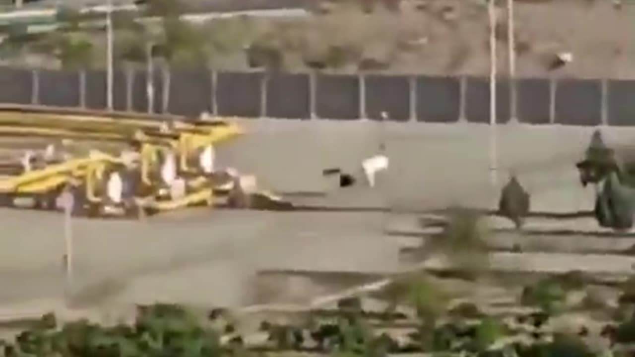 Footage shows long queues of cars reportedly trying to leave Tehran