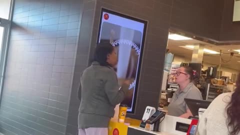 McD's manager starts yelling in pain after a feral sheboon threw a scalding cup of hot coffee on her
