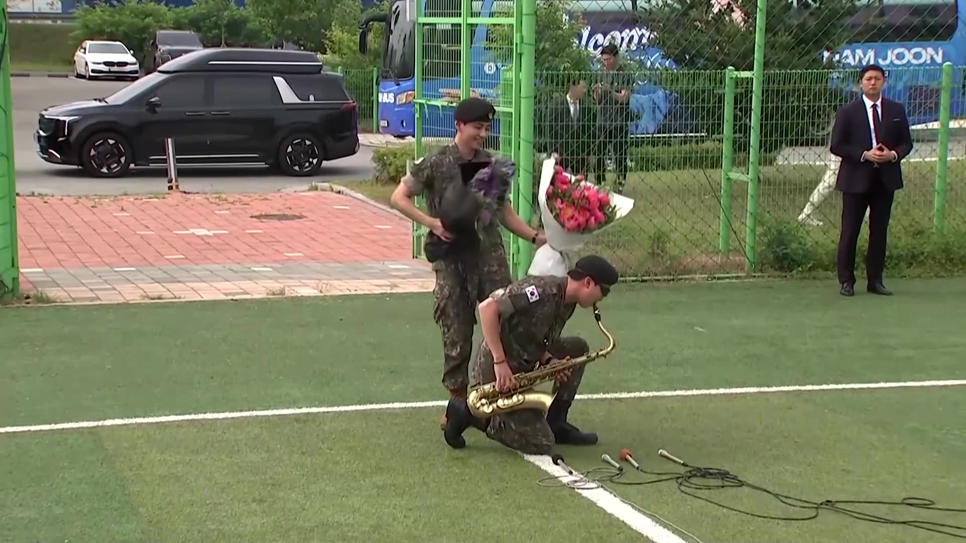 BTS member RM serenades fans with a saxophone after military discharge