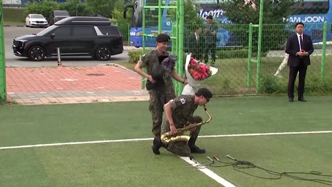 BTS member RM serenades fans with a saxophone after military discharge