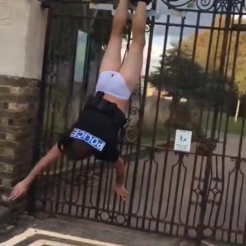 Cop gets stuck on the fence 😂😂😂
