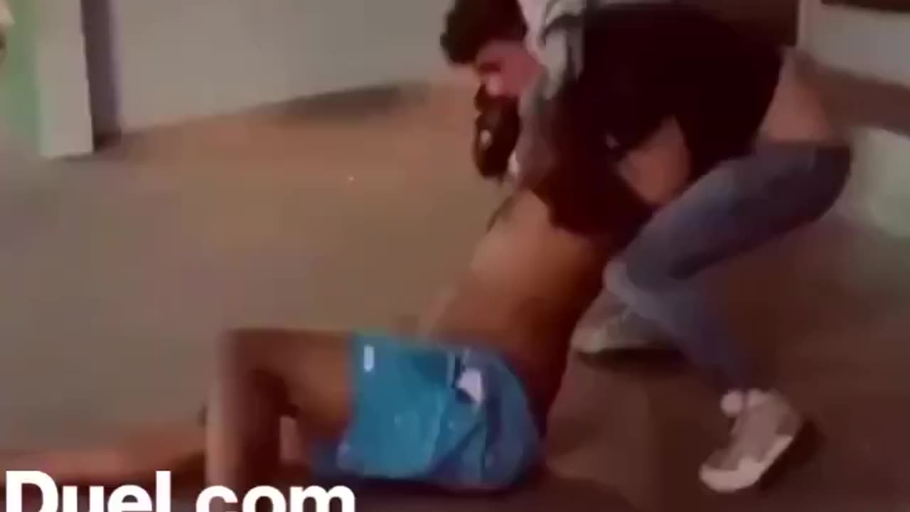 White man jiujitsu chokes Negro to sleep