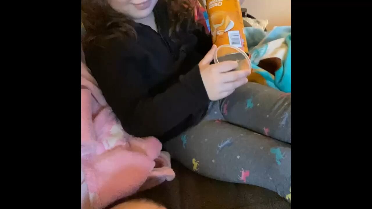 Eating chips on the couch