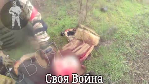Russian soldiers make contact with Ukrainian position while moving along a forest belt.