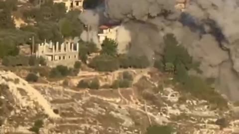 Footage posted by Lebanese media shows an Israeli airstrike against a building in the southern