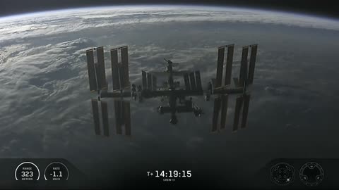 SpaceX · Dragon above the Space Station as it approaches for docking