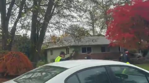 Kiley Delgado tells a police officer she is going to report him to Oregon's sanctuary city