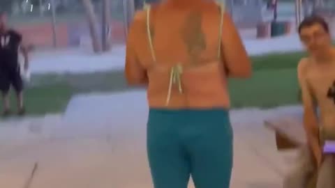 Furious woman confronts ‘transgender’ man wearing a bikini after he tried to go in a girls bathroom.