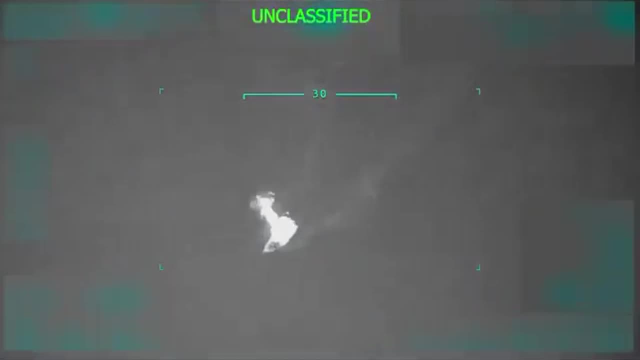 Drone footage of US forces conducting a lethal strike on a reported drug smuggling vessel