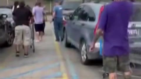 WATCH: A knife-wielding man was confronted by an armed civilian following a