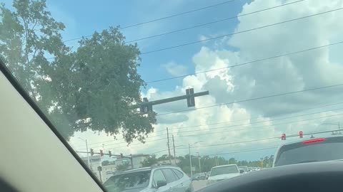 Driver Pulls Into Oncoming Lane at Intersection