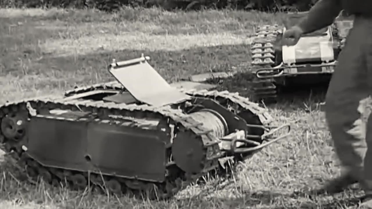 US soldiers messing around with Goliath tracked mines captured in Italy in 1944