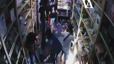 The "French" looting a phone shop "celebrating" PSG winning the champions league.
