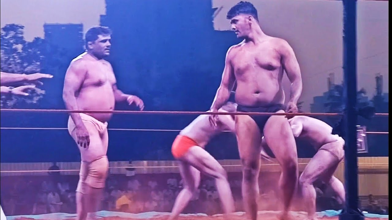 Kushti Wrestling Tournament in Mumbai: young boys bouts in mud