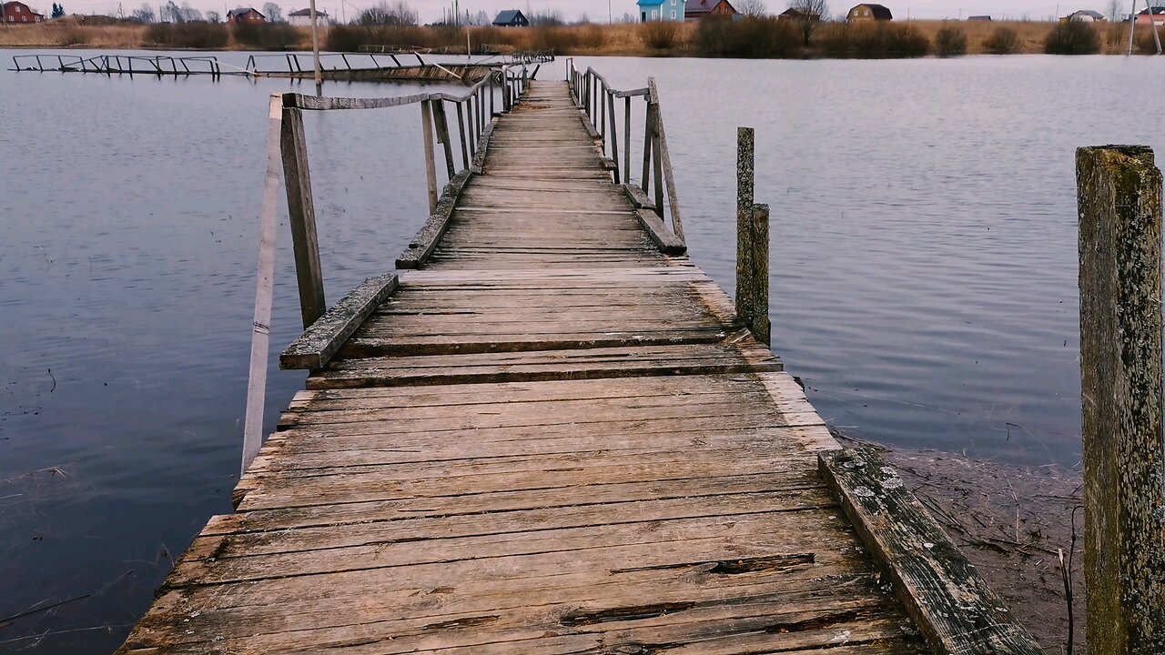 A Broken-Down River Boardwalk