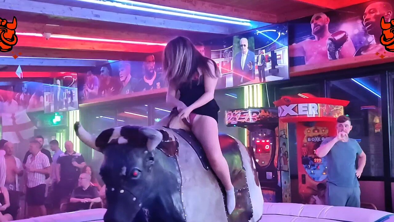 GIRL BULL RIDING