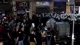 Riot police clash with anti-government protesters in Belgrade