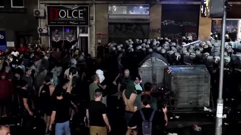 Riot police clash with anti-government protesters in Belgrade