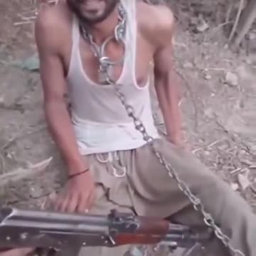 Pakistani chained and shot